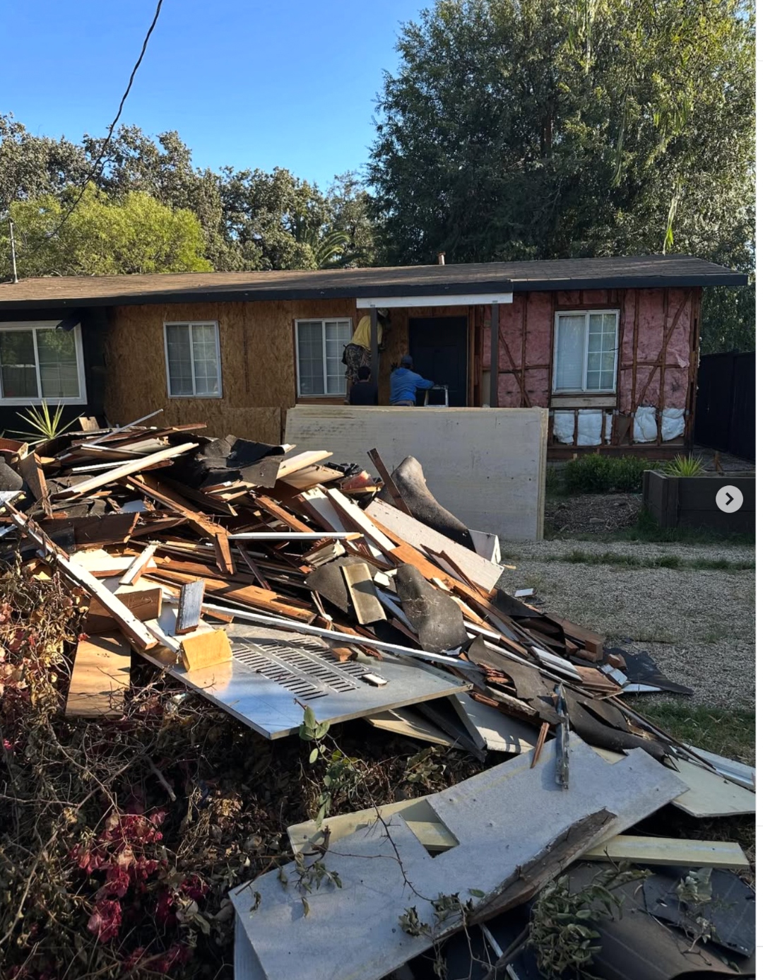 During demolition: debris pile and exposed framing at the Thousand Oaks residence