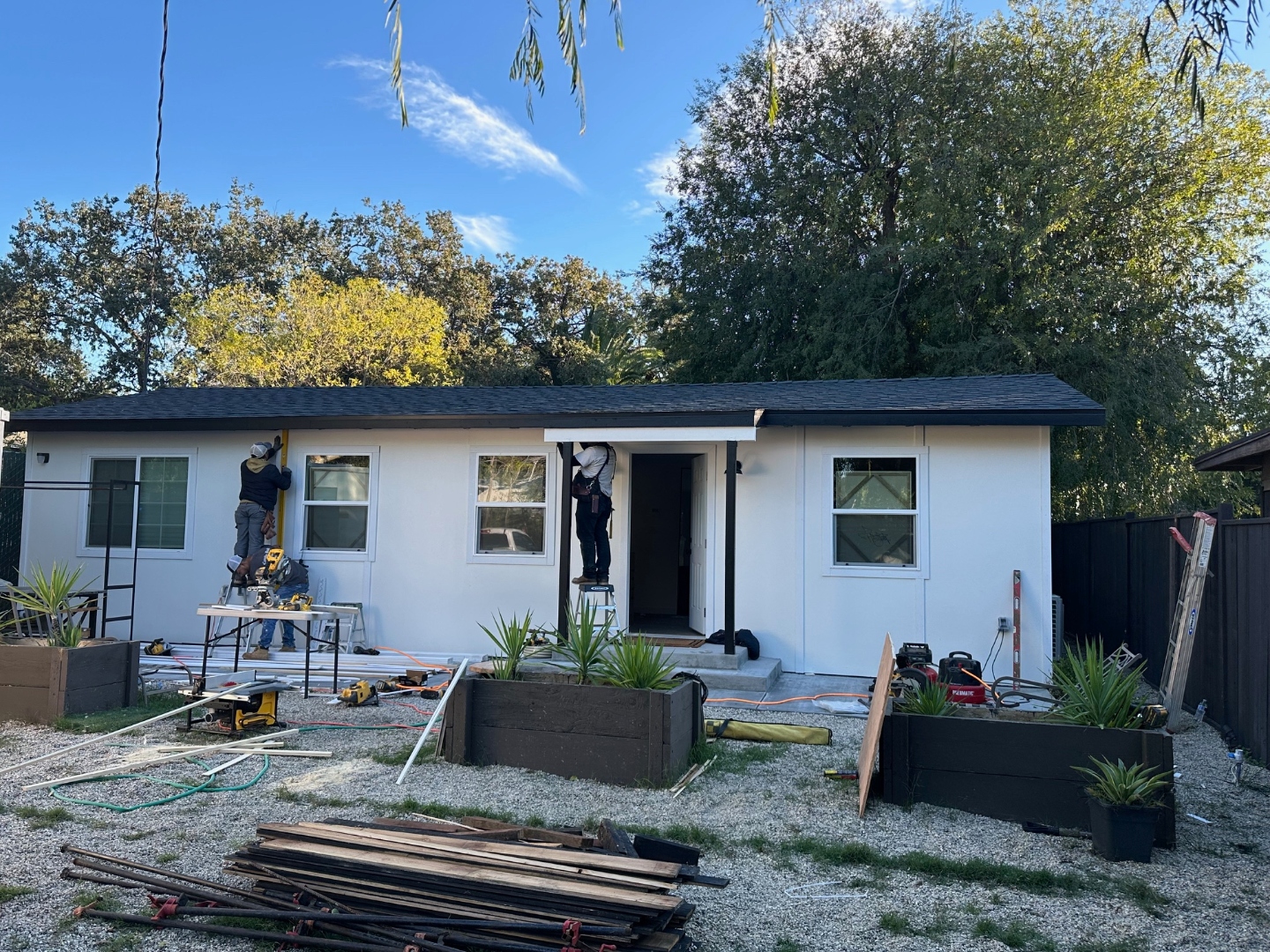 Nearly completed Thousand Oaks residence remodel — fresh white stucco exterior with new trim